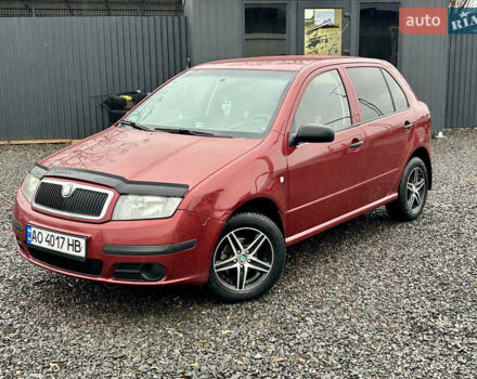 Красный Шкода Фабия, объемом двигателя 1.2 л и пробегом 189 тыс. км за 3599 $, фото 1 на Automoto.ua