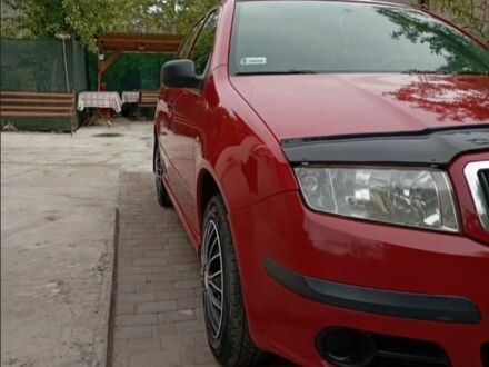 Красный Шкода Фабия, объемом двигателя 1.4 л и пробегом 285 тыс. км за 3990 $, фото 1 на Automoto.ua