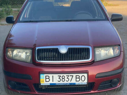 Красный Шкода Фабия, объемом двигателя 1.2 л и пробегом 233 тыс. км за 2950 $, фото 1 на Automoto.ua