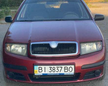 Красный Шкода Фабия, объемом двигателя 1.2 л и пробегом 233 тыс. км за 2950 $, фото 1 на Automoto.ua