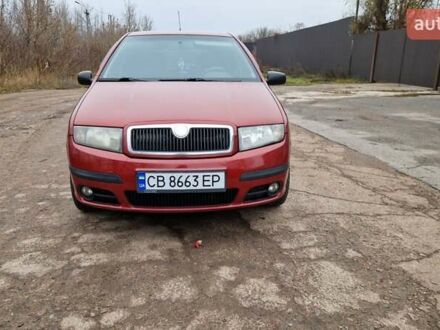 Красный Шкода Фабия, объемом двигателя 1.4 л и пробегом 331 тыс. км за 3950 $, фото 1 на Automoto.ua