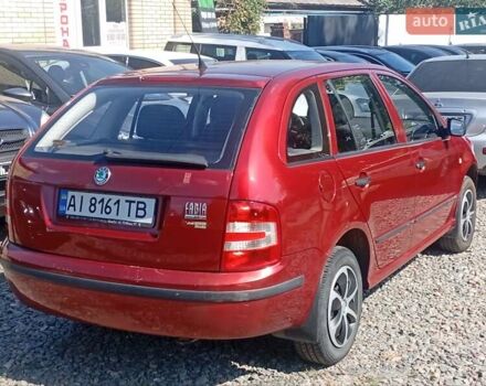 Красный Шкода Фабия, объемом двигателя 1.2 л и пробегом 280 тыс. км за 3400 $, фото 1 на Automoto.ua