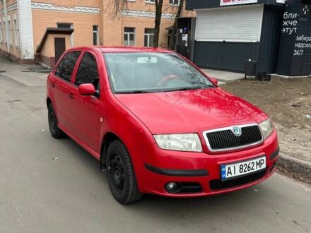 Красный Шкода Фабия, объемом двигателя 1.4 л и пробегом 290 тыс. км за 3700 $, фото 1 на Automoto.ua