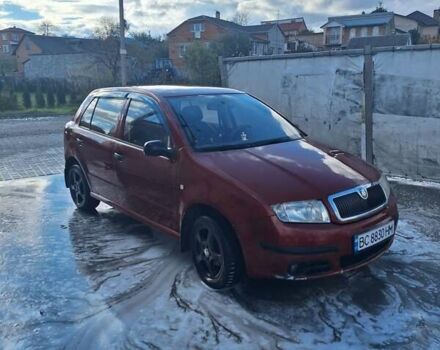 Красный Шкода Фабия, объемом двигателя 1.2 л и пробегом 260 тыс. км за 2700 $, фото 1 на Automoto.ua