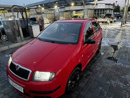 Красный Шкода Фабия, объемом двигателя 1.2 л и пробегом 248 тыс. км за 4000 $, фото 1 на Automoto.ua