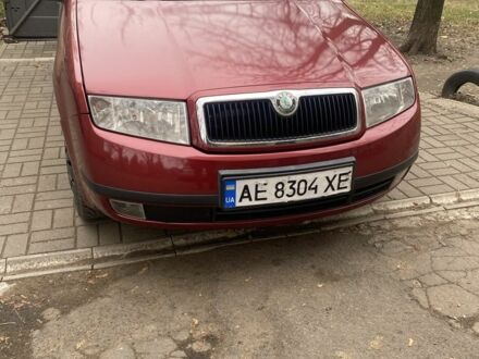 Красный Шкода Фабия, объемом двигателя 1.2 л и пробегом 213 тыс. км за 3500 $, фото 1 на Automoto.ua
