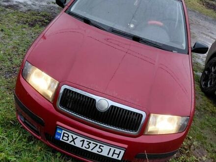 Красный Шкода Фабия, объемом двигателя 1.2 л и пробегом 156 тыс. км за 4050 $, фото 1 на Automoto.ua