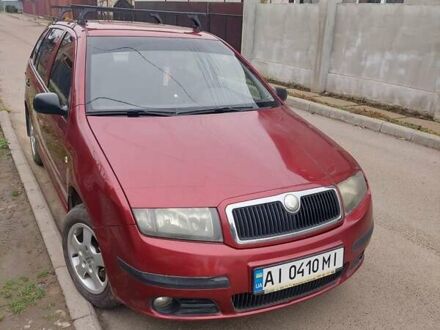Красный Шкода Фабия, объемом двигателя 1.2 л и пробегом 295 тыс. км за 3250 $, фото 1 на Automoto.ua