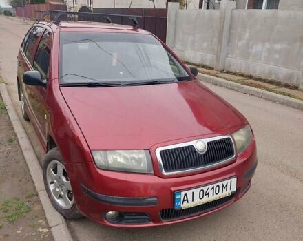 Красный Шкода Фабия, объемом двигателя 1.2 л и пробегом 295 тыс. км за 3250 $, фото 1 на Automoto.ua
