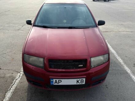 Красный Шкода Фабия, объемом двигателя 1.2 л и пробегом 283 тыс. км за 3700 $, фото 1 на Automoto.ua