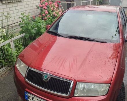 Красный Шкода Фабия, объемом двигателя 1.4 л и пробегом 268 тыс. км за 3500 $, фото 1 на Automoto.ua