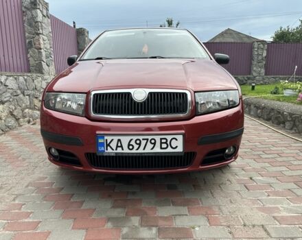 Красный Шкода Фабия, объемом двигателя 1.4 л и пробегом 200 тыс. км за 2999 $, фото 1 на Automoto.ua