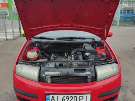 Красный Шкода Фабия, объемом двигателя 1.2 л и пробегом 240 тыс. км за 4200 $, фото 1 на Automoto.ua