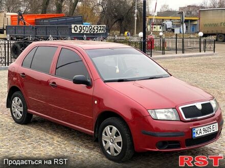Красный Шкода Фабия, объемом двигателя 1.2 л и пробегом 279 тыс. км за 3650 $, фото 1 на Automoto.ua