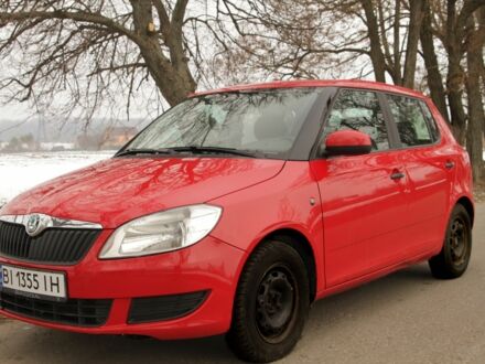 Шкода Фабия 2012 в Полтаве на Automoto.ua Красный Шкода Фабия, объемом двигателя 1.4 л и пробегом 175 тыс. км за 6200 $, фото 1 на Automoto.ua