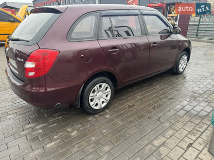 Красный Шкода Фабия, объемом двигателя 1.39 л и пробегом 104 тыс. км за 8000 $, фото 1 на Automoto.ua