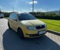 Желтый Шкода Фабия, объемом двигателя 1.4 л и пробегом 217 тыс. км за 2300 $, фото 1 на Automoto.ua