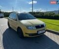 Желтый Шкода Фабия, объемом двигателя 1.4 л и пробегом 217 тыс. км за 2800 $, фото 1 на Automoto.ua