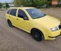 Желтый Шкода Фабия, объемом двигателя 1.4 л и пробегом 209 тыс. км за 4200 $, фото 7 на Automoto.ua