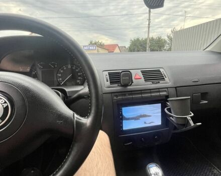 Серый Шкода Фабия, объемом двигателя 1.4 л и пробегом 236 тыс. км за 4200 $, фото 12 на Automoto.ua