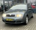 Серый Шкода Фабия, объемом двигателя 1.2 л и пробегом 208 тыс. км за 4000 $, фото 2 на Automoto.ua