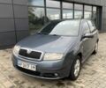 Серый Шкода Фабия, объемом двигателя 1.4 л и пробегом 293 тыс. км за 4200 $, фото 1 на Automoto.ua