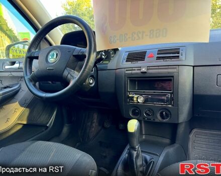 Серый Шкода Фабия, объемом двигателя 1.4 л и пробегом 229 тыс. км за 3700 $, фото 5 на Automoto.ua