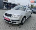 Серый Шкода Фабия, объемом двигателя 1.4 л и пробегом 212 тыс. км за 5500 $, фото 1 на Automoto.ua