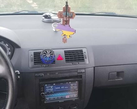 Серый Шкода Фабия, объемом двигателя 1.39 л и пробегом 241 тыс. км за 5000 $, фото 6 на Automoto.ua