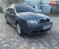 Серый Шкода Фабия, объемом двигателя 1.39 л и пробегом 197 тыс. км за 3950 $, фото 2 на Automoto.ua
