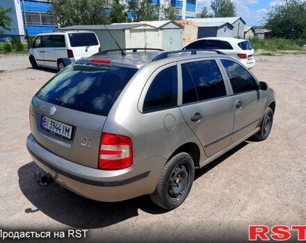 Серый Шкода Фабия, объемом двигателя 1.4 л и пробегом 280 тыс. км за 3200 $, фото 2 на Automoto.ua