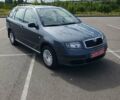 Серый Шкода Фабия, объемом двигателя 1.4 л и пробегом 200 тыс. км за 4900 $, фото 1 на Automoto.ua