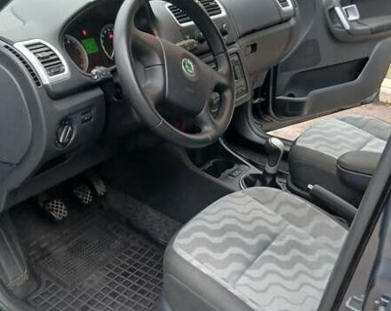 Серый Шкода Фабия, объемом двигателя 1.39 л и пробегом 232 тыс. км за 6500 $, фото 12 на Automoto.ua