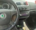 Серый Шкода Фабия, объемом двигателя 1.39 л и пробегом 183 тыс. км за 4200 $, фото 9 на Automoto.ua