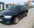 Синий Шкода Фабия, объемом двигателя 1.39 л и пробегом 284 тыс. км за 2800 $, фото 1 на Automoto.ua