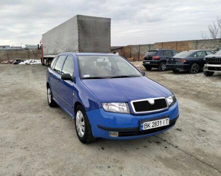 Синий Шкода Фабия, объемом двигателя 1.4 л и пробегом 250 тыс. км за 1800 $, фото 1 на Automoto.ua