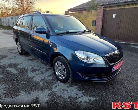 Синий Шкода Фабия, объемом двигателя 1.4 л и пробегом 242 тыс. км за 6850 $, фото 1 на Automoto.ua