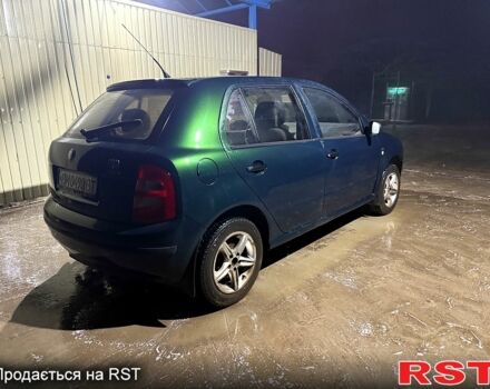 Зеленый Шкода Фабия, объемом двигателя 1.4 л и пробегом 100 тыс. км за 3500 $, фото 2 на Automoto.ua
