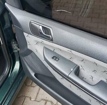 Зелений Шкода Фабія, об'ємом двигуна 1.39 л та пробігом 240 тис. км за 3399 $, фото 13 на Automoto.ua