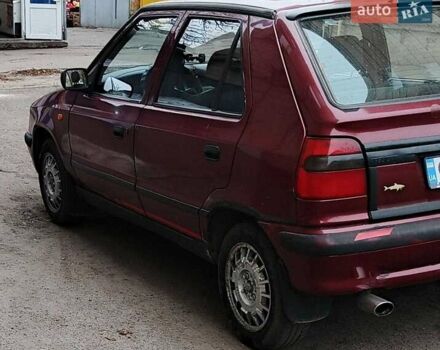 Красный Шкода Фелиция, объемом двигателя 1.3 л и пробегом 402 тыс. км за 1183 $, фото 1 на Automoto.ua