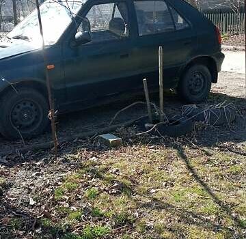 Зелений Шкода Феліція, об'ємом двигуна 1.3 л та пробігом 446 тис. км за 1203 $, фото 7 на Automoto.ua