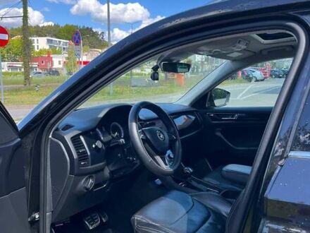 Черный Шкода Kodiaq, объемом двигателя 2 л и пробегом 259 тыс. км за 18000 $, фото 1 на Automoto.ua