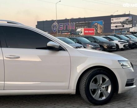 Белый Шкода Octavia A7, объемом двигателя 1.6 л и пробегом 302 тыс. км за 14290 $, фото 10 на Automoto.ua