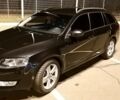 Чорний Шкода Octavia A7, об'ємом двигуна 2 л та пробігом 233 тис. км за 14500 $, фото 1 на Automoto.ua