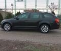 Черный Шкода Octavia A7, объемом двигателя 1.6 л и пробегом 177 тыс. км за 13800 $, фото 1 на Automoto.ua