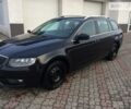 Черный Шкода Octavia A7, объемом двигателя 1.6 л и пробегом 241 тыс. км за 15600 $, фото 1 на Automoto.ua