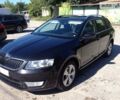 Черный Шкода Octavia A7, объемом двигателя 1.6 л и пробегом 200 тыс. км за 11900 $, фото 1 на Automoto.ua