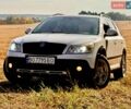 Белый Шкода Октавия Скаут, объемом двигателя 1.97 л и пробегом 355 тыс. км за 10500 $, фото 1 на Automoto.ua