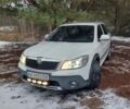 Белый Шкода Октавия Скаут, объемом двигателя 2 л и пробегом 257 тыс. км за 11750 $, фото 1 на Automoto.ua