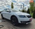 Белый Шкода Октавия Скаут, объемом двигателя 2 л и пробегом 214 тыс. км за 13999 $, фото 1 на Automoto.ua